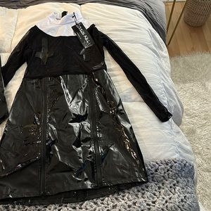 Black pleather nun costume, size 1x and unopened.